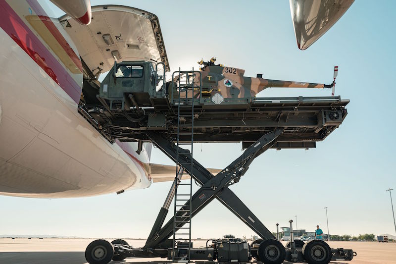 The last five Enhanced MD 530F Cayuse Warrior helicopters ordered for the Afghanistan is loaded onto a Boeing 747 for shipment to the customer.