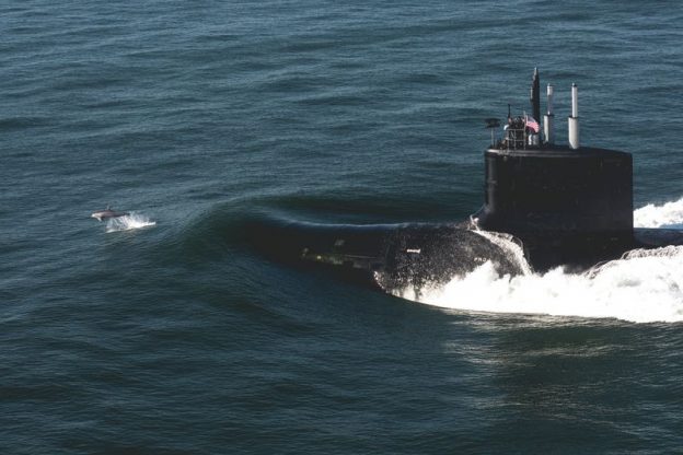 The Virginia-class submarine Delaware (SSN 791) sails the open waters after departing Huntington Ingalls Industriesâ€™ Newport News Shipbuilding division during sea trials in August. Photo by Ashley Cowan/HII.